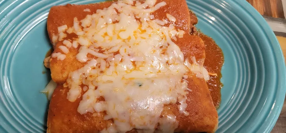 One Tostaguac One Enchilada and Beans